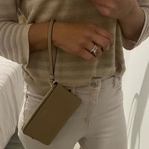 Coach small wristlet in nude. Never used!